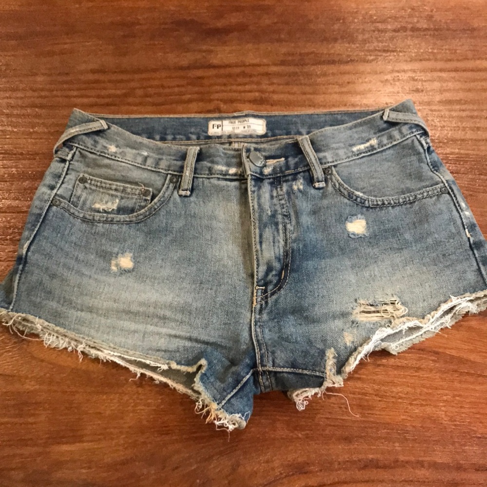 Distressed light wash denim shorts